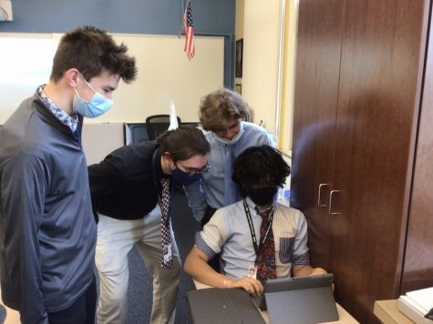 Sophomores Jack Kaczmarkski, Finn Kiniry, Ben Jackson, and Kolbe Viator work on a recent in-class review assignment.