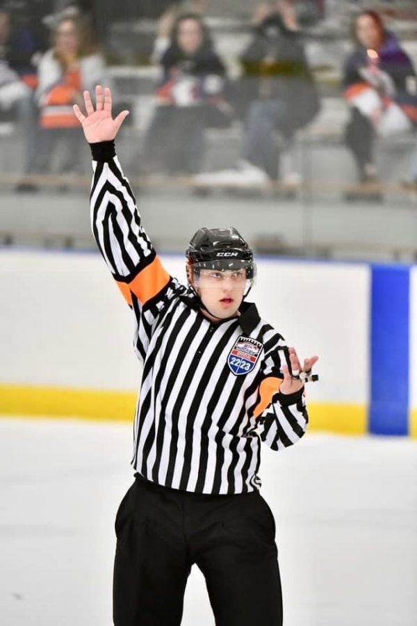 Jack Sabo, 23 calls a penalty in the Semifinals of the 2023 USA Hockey National Championship in Buffalo, NY. 